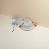 White circular LED downlight strip with orange clips and white driver power supply Application Scenario
